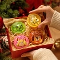 thumbnail image 5 of Christmas Glitter Dumpling Squishy Box, 4 Random Styles Slow Rising Squeeze Toys, 3.3 Inch, 5 of 9
