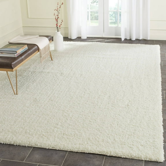 SAFAVIEH Laguna Neven Plush Solid Shag Area Rug, Ivory, 5'3" x 7'6"