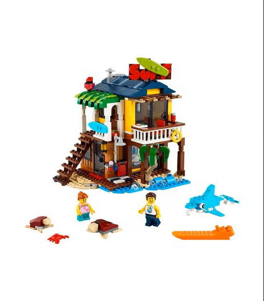 LEGO Creator 3 in 1 Surfer Beach House with 2 Minifigures and Dolphin Figure, Transforms from Surf Shack to Lighthouse to Pool House, Great Building Toy Set for Kids, Girls, and Boys Ages 8+, 31118