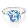 thumbnail image 2 of Gem Stone King 925 Sterling Silver Millennium Blue Mystic Quartz and White Created Sapphire 3 Stone Ring for Women (3.03 Cttw, Oval 10X8MM, Gemstone Birthstone, Size 5), 2 of 4