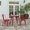 Brown Top/Red Frame, variant on Merrick Lane Indoor/Outdoor Dining Table, 23.75" Square All Weather Black Poly Resin Top with Black Steel Base