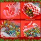thumbnail image 3 of Bolsas de regalo de Navidad Fuutreo, 50 unidades, copos de nieve, plástico, 14 x 22 cm, 3 of 6