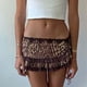 thumbnail image 2 of Minifalda de Encaje Y2K para Mujer, de Tiro Bajo, con Estampado de Leopardo, con Volantes en Contraste, Corta y Holgada, Estilo Enagua. Color Café M, 2 of 3