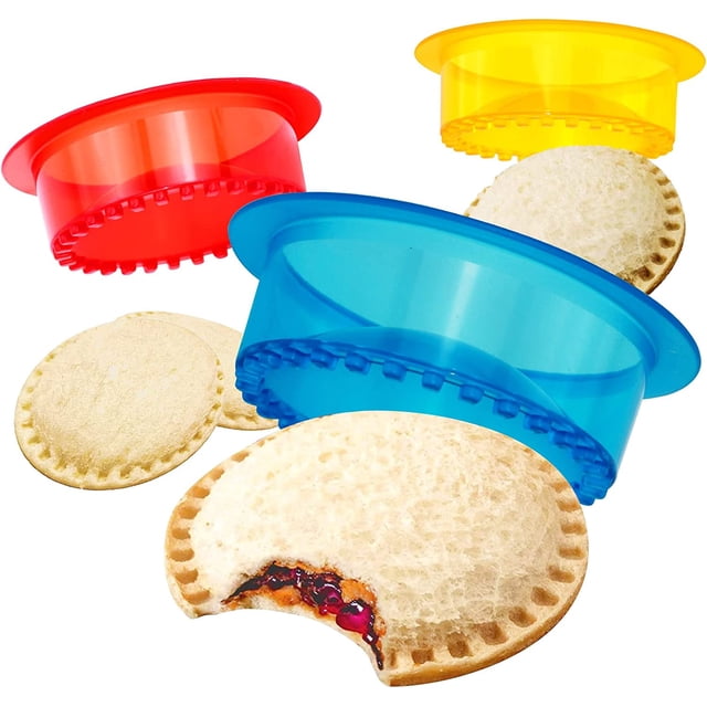 GHSDFBB Sandwich Cutter and Sealer, Pack of 5 in vibrant blue, red, and yellow colors. These sandwich makers are designed for kids and feature a patented design to seal and decrust sandwiches without crushing fillings. Ideal for creating crustless sandwiches, pancakes, cookies, and more for lunchboxes, picnics, or snacks. Includes round cutters with ridged edges for easy use and safe handling.