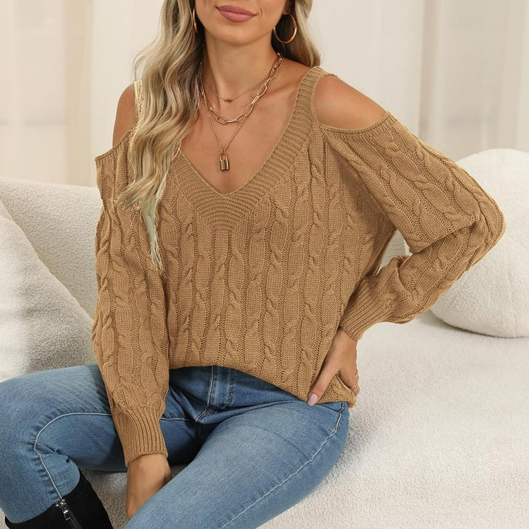 Long-sleeved V-neck sweater with a strapless top Long-sleeved V-neck sweater with a strapless top