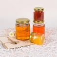 thumbnail image 4 of 30 Pack Mini Glass Honey jars-1.5 oz，Mini Hexagon Glass Honey Jars with Wooden Dippers - Gold Lid, Bee Pendants, Rope & Ribbon Accents - Perfect for Wedding Favors, Party Favors, Dishwasher Safe, 4 of 7