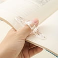thumbnail image 1 of Marcadores De Acrílico Clip de acrílico transparente para sujetar libros, ayuda de lectura, soporte ligero para lectura con manos libres (transparente, 1 unidad) JASKFLY, 1 of 8