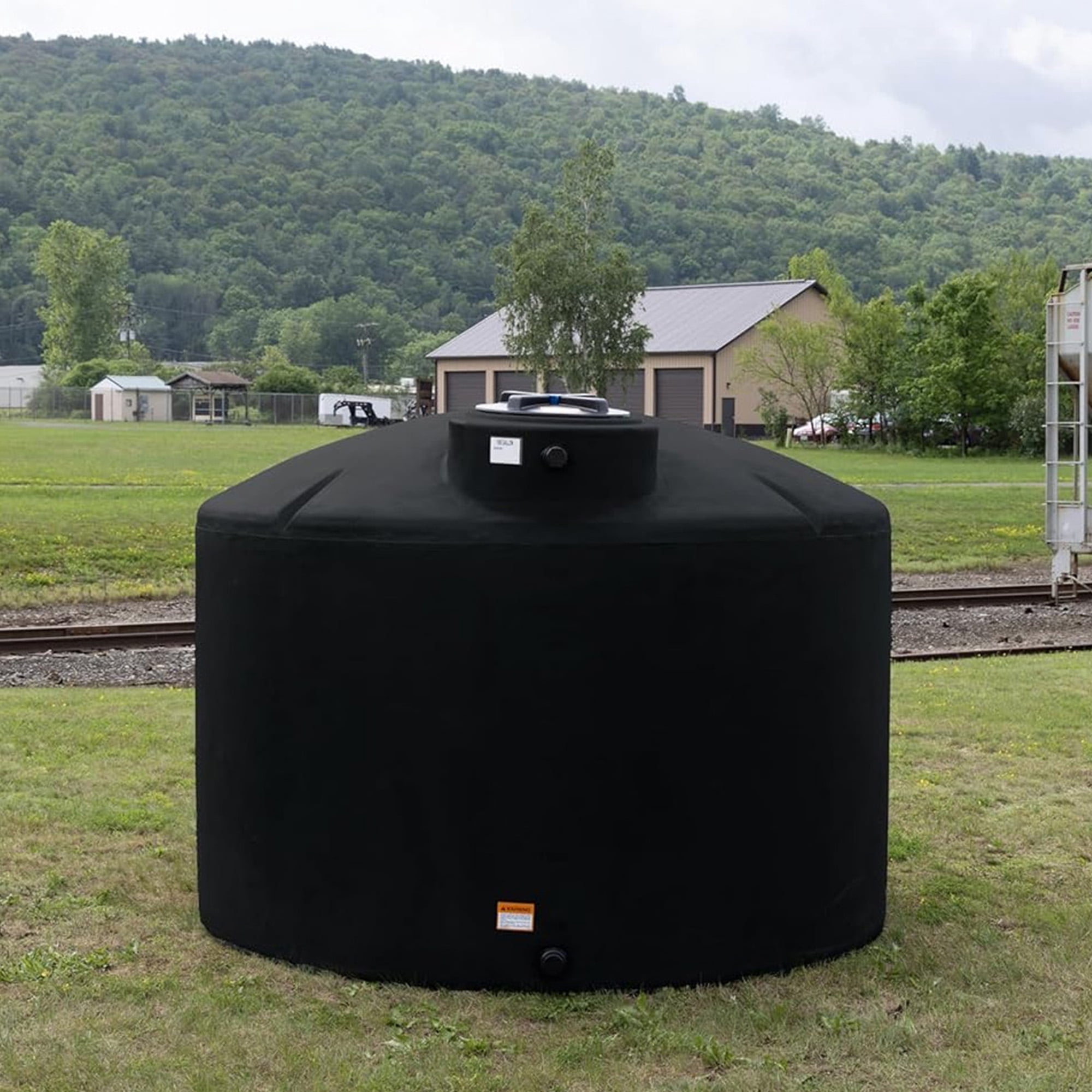 Norwesco Water Tank with 16" Lid, Outdoor Storage Container, 1550 Gallon, Black