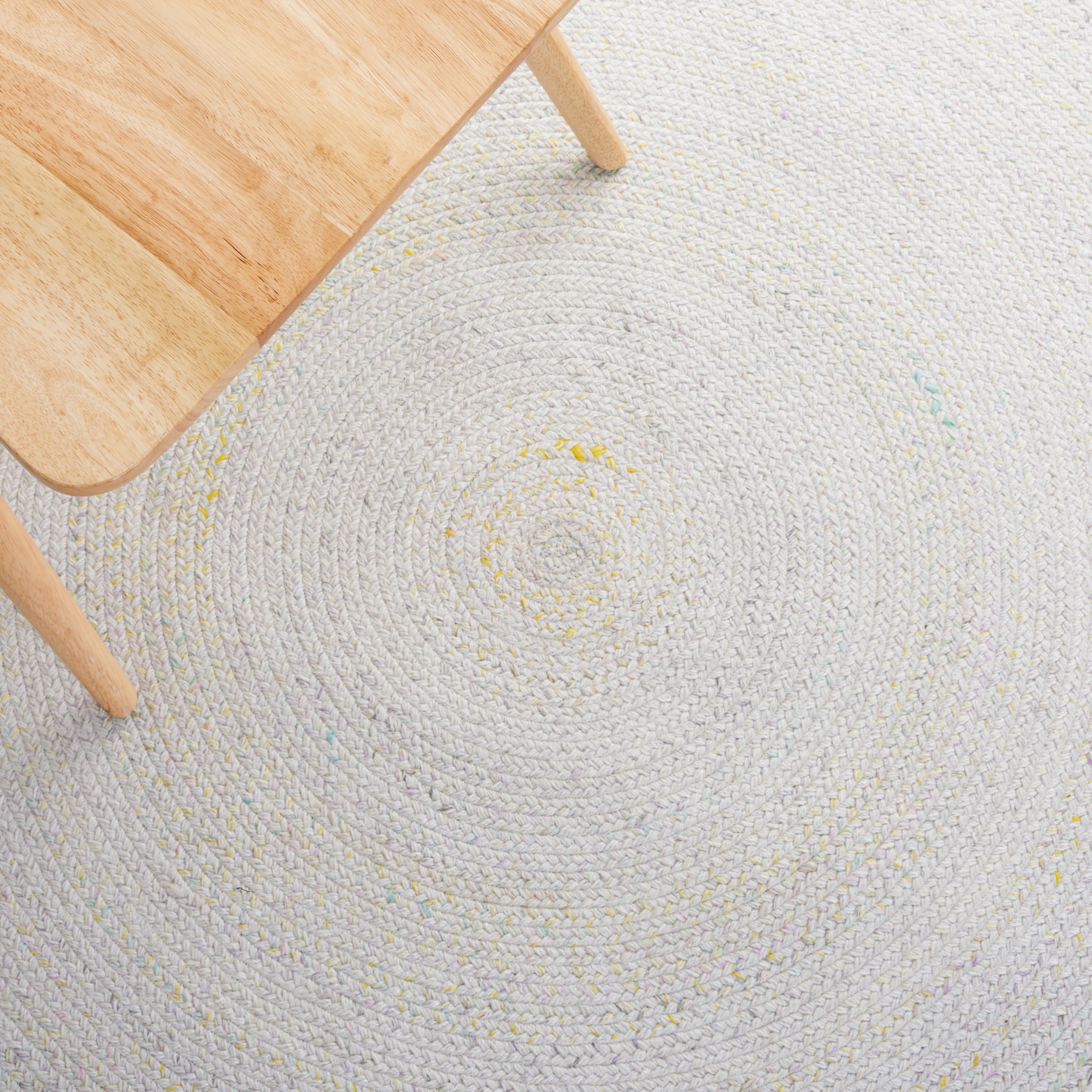 SAFAVIEH Braided Lyla Solid Polyester Reversible Area Rug, Ivory/Yellow, 5' x 5' Round