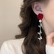 thumbnail image 4 of Pendientes para mujer, regalos para mujer. Encantadores pendientes de flores rojas y borlas de mariposas de temporada que irradian elegancia y sofisticación. Pendientes de rosas., 4 of 5