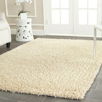 SAFAVIEH Clyde Solid Plush Polyester Shag Area Rug, Cream, 8' x 10'