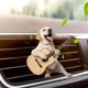 thumbnail image 2 of Ambientador con forma de guitarra y perro para ventilación de coche, decoración 2D para el salpicadero para amantes de los perros, regalo novedoso fácil de colocar para el interior del coche., 2 of 8
