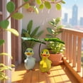 thumbnail image 7 of ICERUN Garden Statues,Resin Yellow Umbrella Duck Sculpture Garden Decorations,Rounded Eye Design Duck Outdoor Statues,Style1, 7 of 7