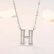 thumbnail image 1 of Collar con colgante de tu nombre, mi apellido y 26 palabras en inglés para hija., 1 of 3