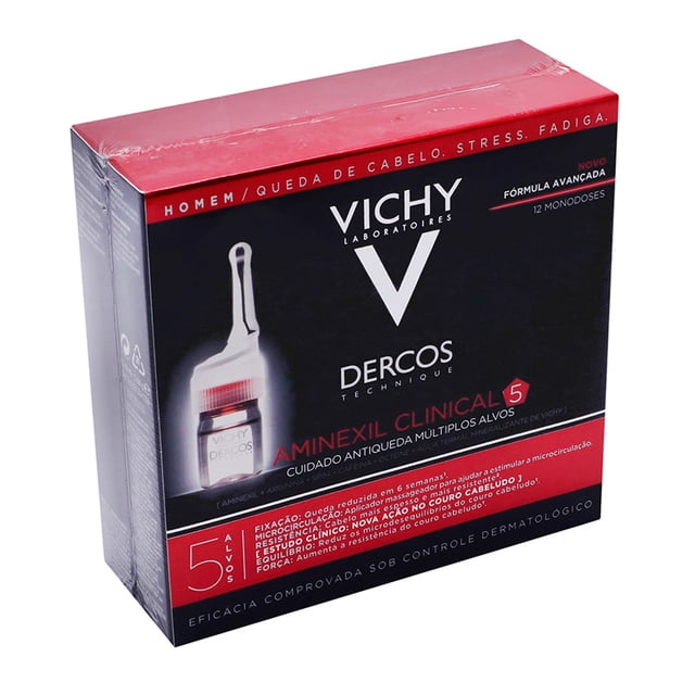 aminexil 5 ampolletas hombre aminexil caja Vichy Dercos caja frontal en ángulo con diseño negro y rojo y logo Vichy, ilustración de una ampolla transparente con tapón blanco y rojo impresa en el frente; envase de cartón sellado, indicado para cuidado capilar masculino.