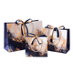 thumbnail image 1 of Juego de bolsas de regalo de mármol dorado azul con cinta, paquete de 3, 1 of 4