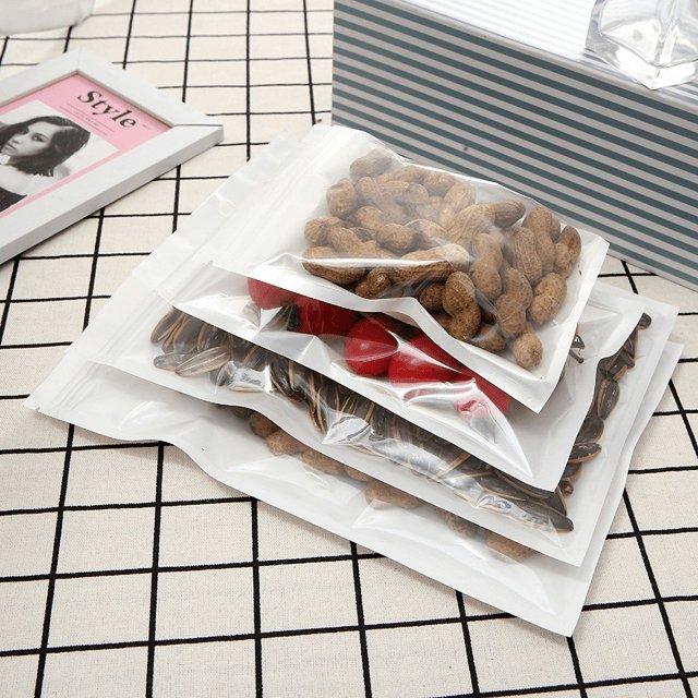 Bolsa ziplock para joyería, bolsa de hueso con película de perla, bolsa de plástico translúcida, bolsa de plástico para aparejos de pesca, bolsa de embalaje para fundas de teléfonos móviles