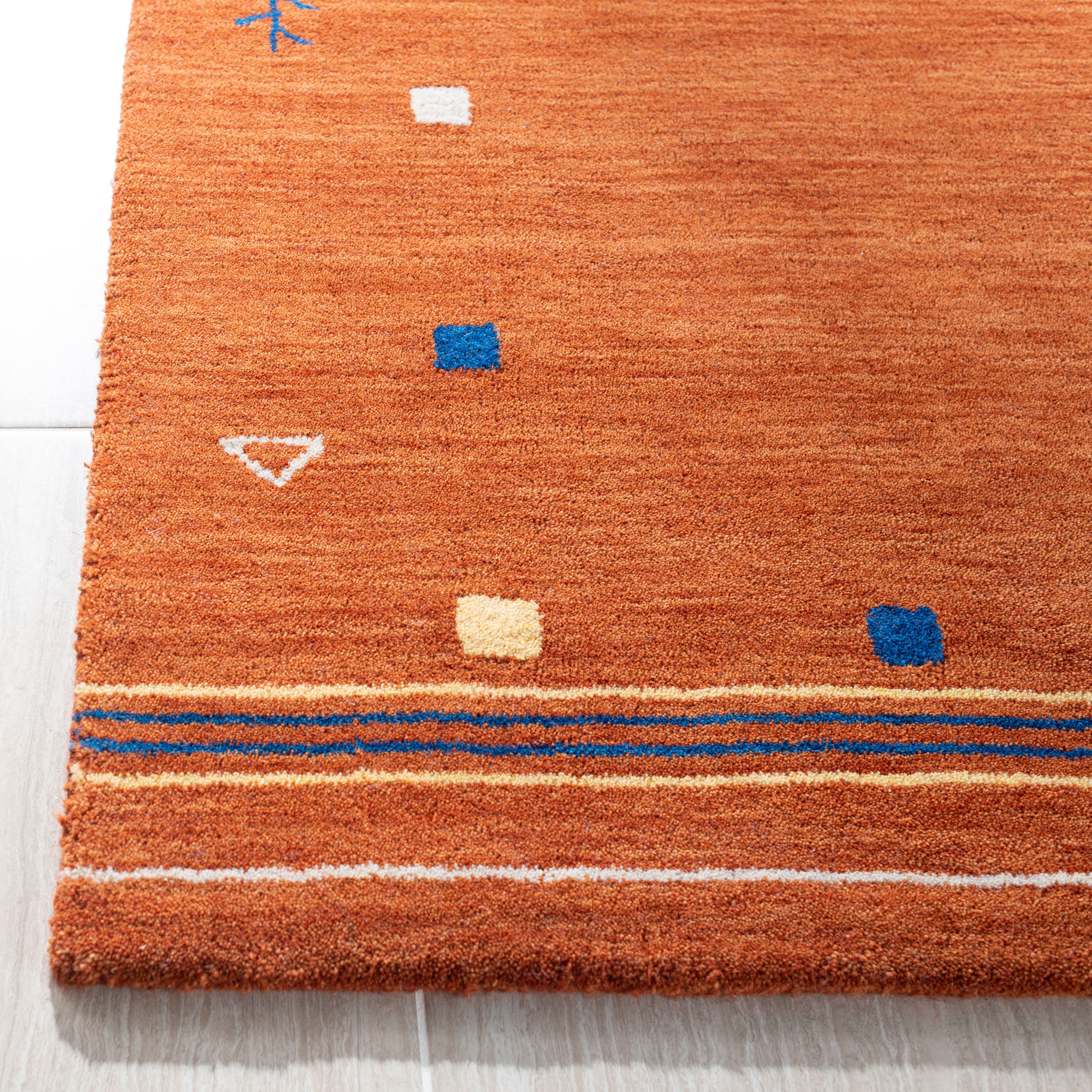 Safavieh Himalaya Charmaine Solid Wool Area Rug, Rust, 5' x 8'