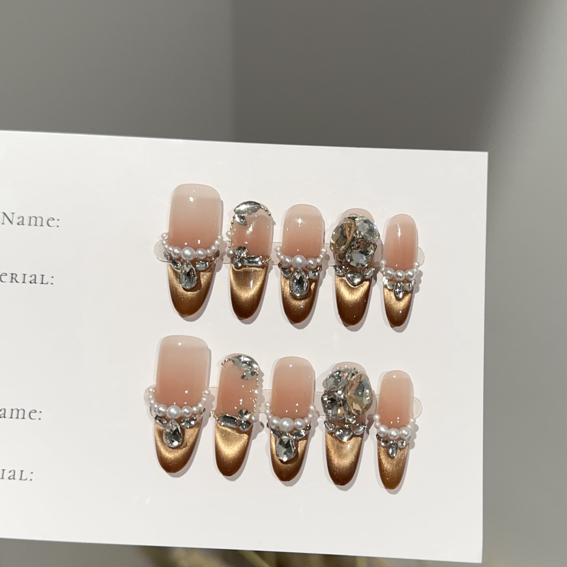 Purely handmade wear nail pads, advanced sense autumn and winter brown cat's eye nail pads, pearl diamond fake nail patches wholesale