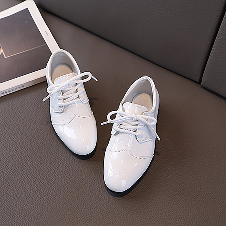 boys white dress shoes L'Amour Luke Beige Two Tone Leather Saddle Shoe Beige / Kid 2 adjustable lace up closure for a comfortable fit Premium cushioned insole for all day comfort Odor free stitched sole with a stapled heel for stability and long term durability Available in a full range of toddler 8 Ways To Style Boys'