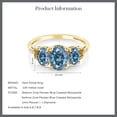 thumbnail image 4 of Gem Stone King 10K Yellow Gold Persian Blue Moissanite and White Diamond 3-Stone Engagement Ring for Women (2.32 Cttw, Oval 8X6MM and 6X4MM, Gemstone Birthstone, Size 7.5), 4 of 4