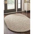 thumbnail image 1 of Unique Loom 3151360 5 x 8 ft. Solid Shag Oval Rug, Taupe, 1 of 2