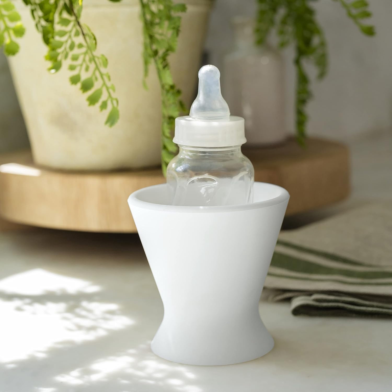Bökee Baby Bottle and Breast Pump Holder and Snack Bowl – Silicone One Hand Milk & Formula Prep with Suction Cup - Dishwasher Safe - White, 1-Pack