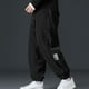 thumbnail image 1 of Pantalones largos para hombre, color liso, holgados, informales, con bolsillo, cordón ajustable, cintura elástica, pantalones deportivos de poliéster para hombre., 1 of 6