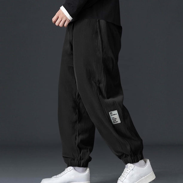 Pantalones largos para hombre, color liso, holgados, informales, con bolsillo, cordón ajustable, cintura elástica, pantalones deportivos de poliéster para hombre.
