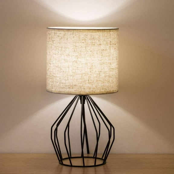 Black Bedside Table Lamp Modern Style Black Hollowed Out Base with Tan Linen Fabric Shade