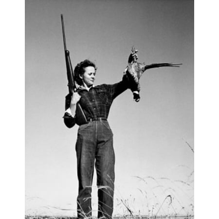 Young woman holding a dead bird and a rifle Canvas Art -  (18 x