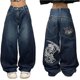 thumbnail image 1 of Pantalones vaqueros holgados Y2k góticos for hombre, vaqueros Y2k de hip hop con estampado de esqueleto, pantalones vaqueros vintage de cintura alta y pierna ancha., 1 of 2