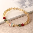 thumbnail image 2 of Pulsera de cuarzo rutilado natural con rueda de oración con mantras, 2 of 2