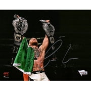 Conor McGregor Ultimate Fighting Championship Autographed 8" x 10" UFC 205 Raising Two Belts Spotlight Photograph - Fanatics Authentic Certified