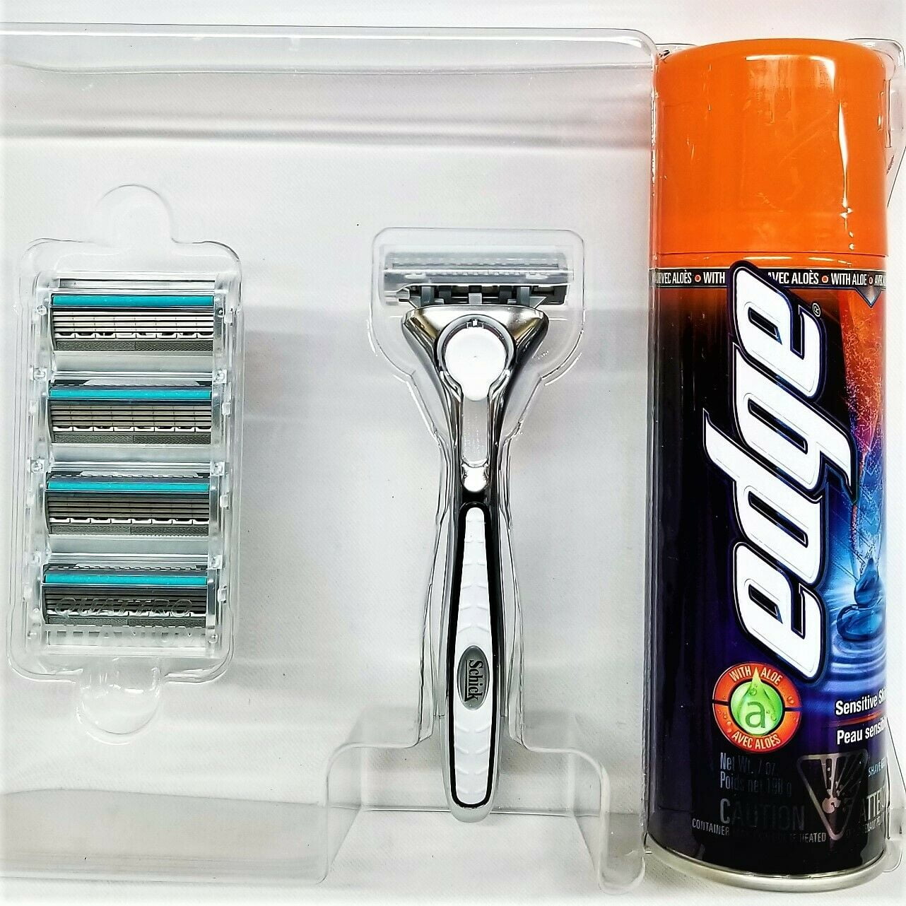 NEW- Schick Quattro Titanium Shaving Starter Gift Set for Men with 1 – Quattro Titanium Razor for Men, 4 – Quattro Titanium Razor Blade Refills for Men, and 1 – Edge Sensitive Skin Shave Gel for Men