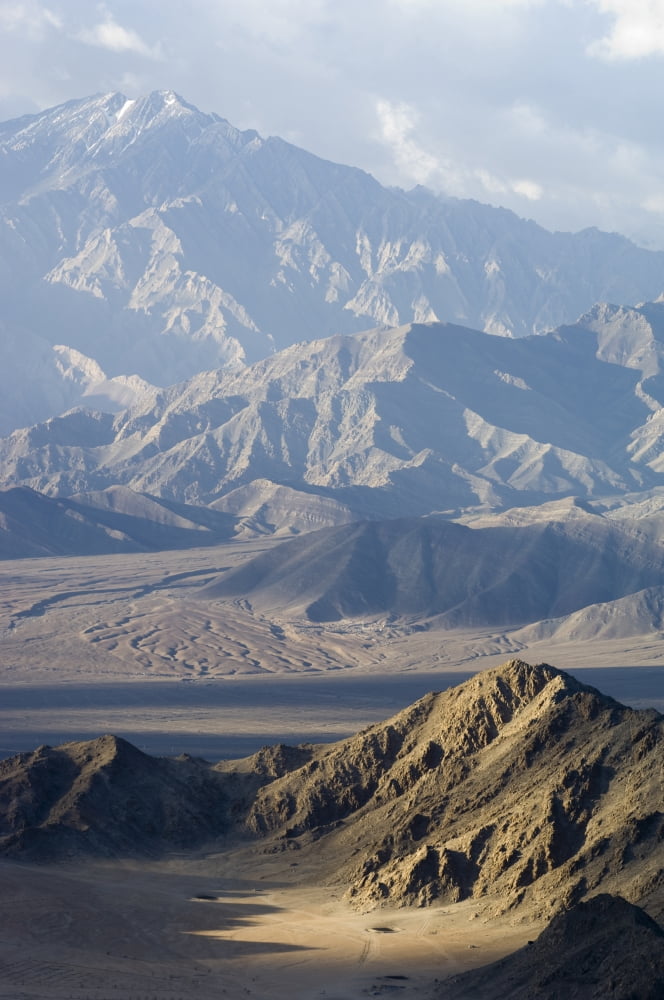 View across the Indus Valley from the Shanti (Peace) Stupa Leh was the capital of the Himalayan kingdom of Ladakh now the Leh District in the state of Jammu and Kashmir India Leh is at an altitude of