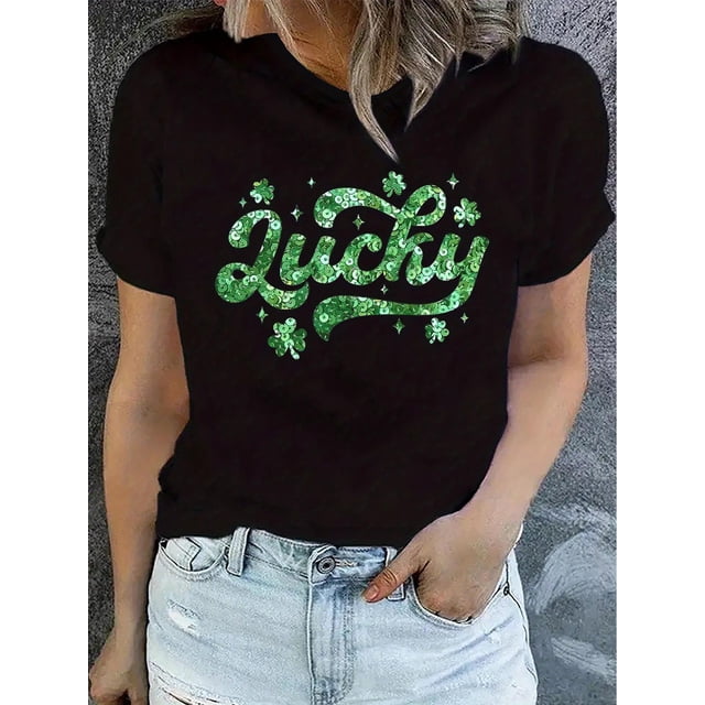 Camiseta gráfica "Lucky" del Día de San Patricio para mujer: cuello redondo informal, manga corta, negra con estampado de trébol verde, mezcla de algodón ligero, ideal para festividades de primavera y