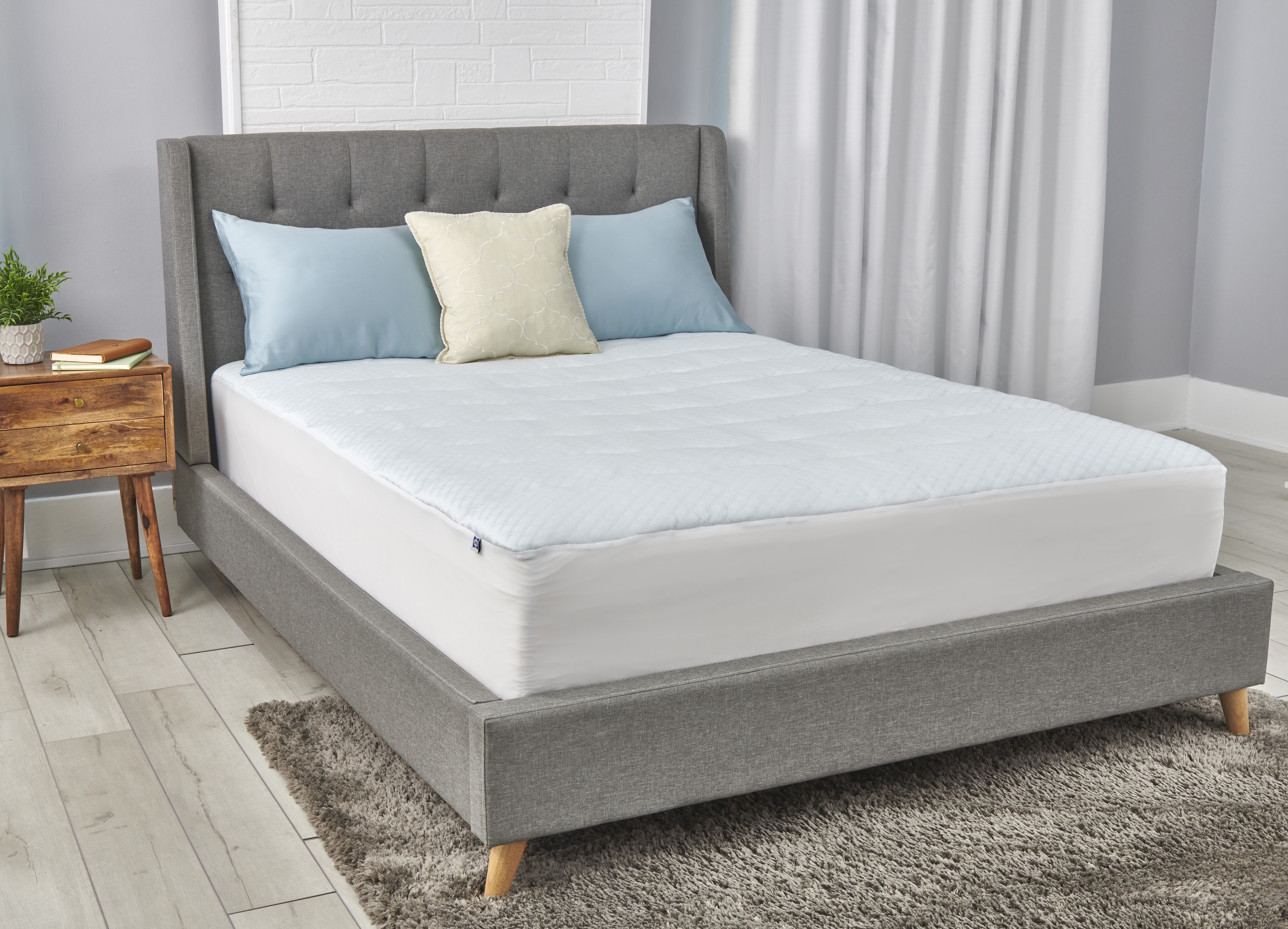 cooling mattress pad with elastic sides