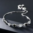 thumbnail image 3 of Gem Stone King 925 Sterling Silver Round White Moissanite and Black Diamond Tennis Bracelet for Women (2.43 Cttw, Gemstone Birthstone, Round 4.5MM, Fully Adjustable up to 9 inch), 3 of 4