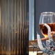 thumbnail image 2 of Florero Dinyeo, grande, cilíndrico, de cristal marrón acanalado, 2 of 6