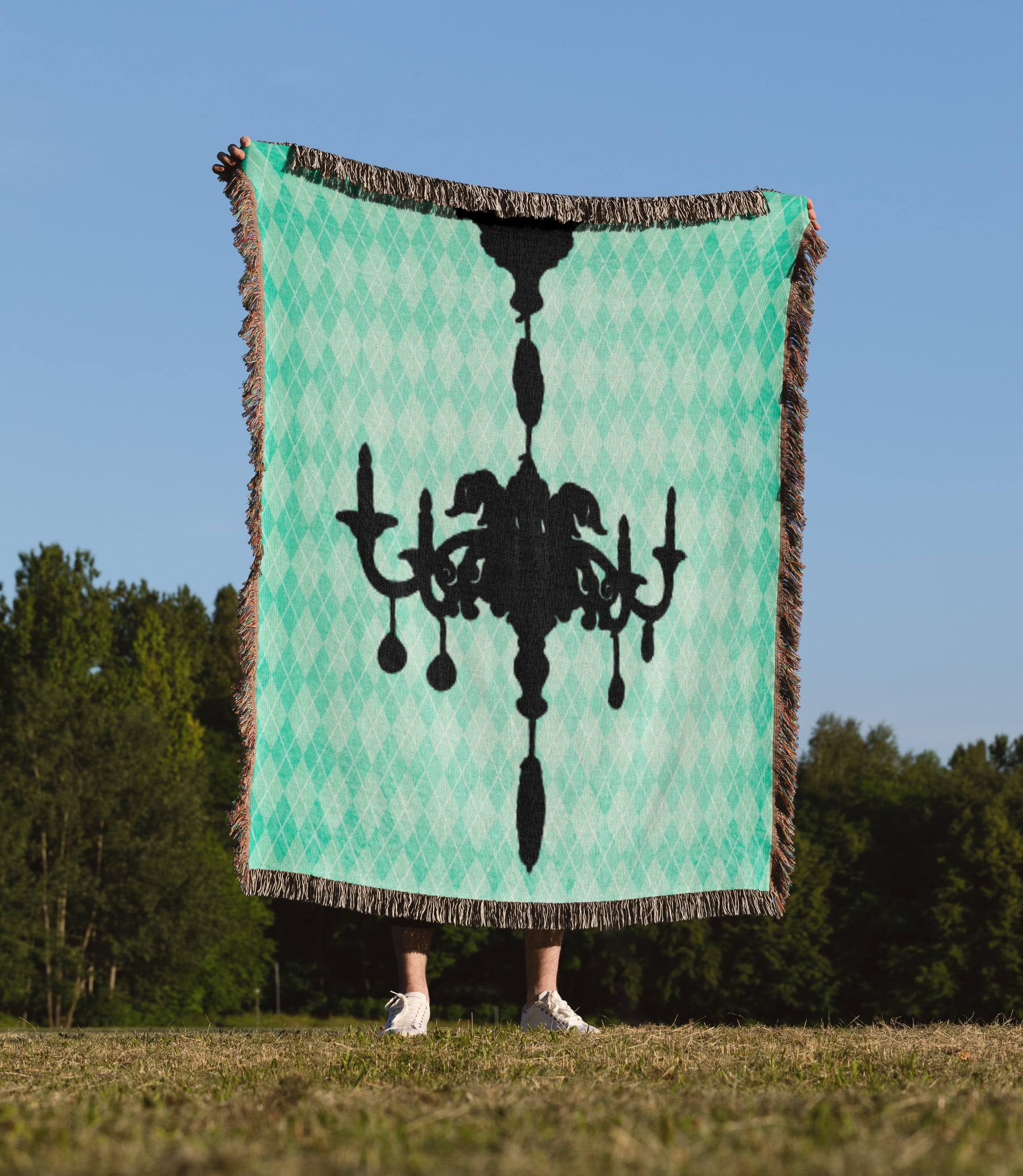 Black Chandelier Against A Turquoise Diamond Background, Woven Blanket