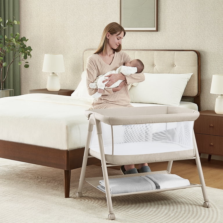 Delta Children Haven AirFlow Bassinet with Breathable Mesh and Wheels, Tan