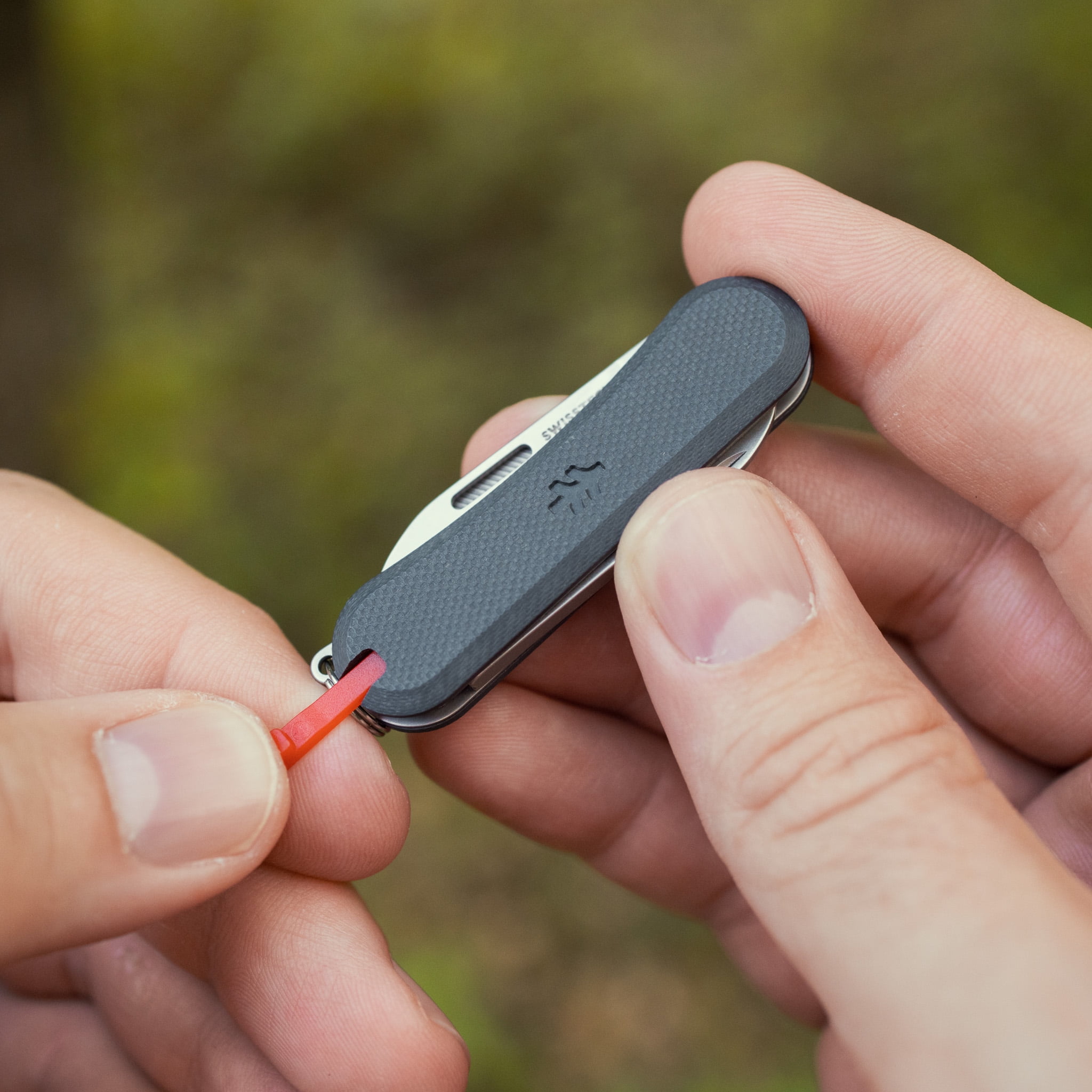 Swiss Tech Listig 7 in 1 Folding Multitool with G-10 Handle