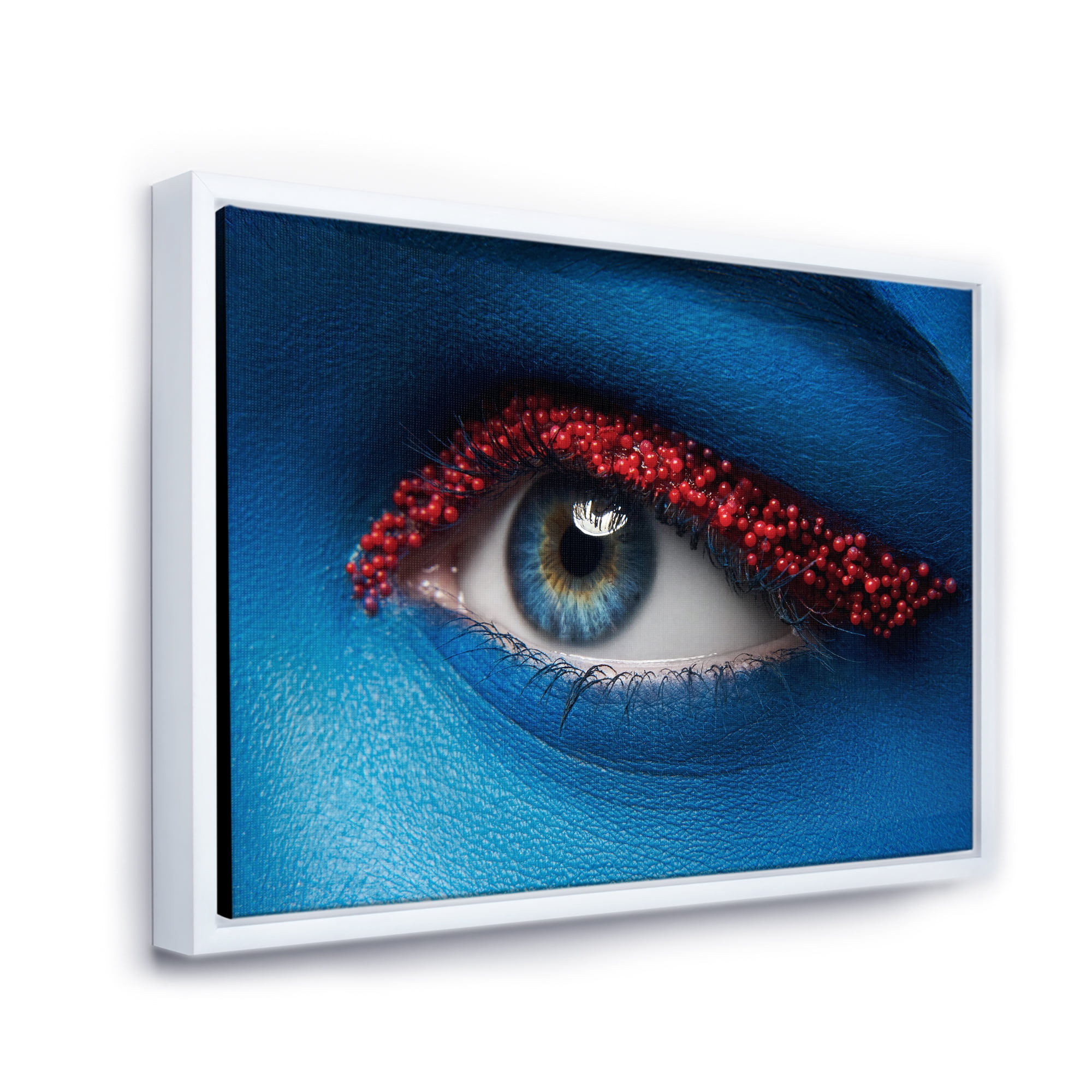 Designart 'Woman Eye With Blue Paint On Face & Red Balls' Modern Framed Canvas Wall Art Print