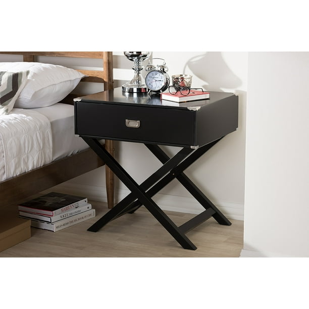 32 on sale (page 1 of 2) overbed tables, also known as hospital bed tables, are specifically configured with a base and lockable wheels to easily slide under a bed, while the tabletop can be adjusted in height to comfortably provide users a secured space for dining, reading, games, computer work and crafts. baxton studio curtice modern and contemporary black 1 drawer wooden bedside table
