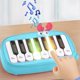 thumbnail image 1 of Piano de bolsillo con botones de colores | Teclado electrónico de 15 teclas para niños de 3 a 6 años | Instrumento musical portátil con luces y sonido | Juguete para principiantes en educació, 1 of 5