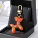 thumbnail image 1 of 1 unidad de llaveros de pareja de animales de dibujos animados Kawaii ostentosos para mujeres y hombres, nuevo bolso colorido para mascotas, soporte para coche, caja de Airpods, joyería Dengxun unisex, 1 of 2