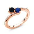 thumbnail image 2 of Gem Stone King 18K Rose Gold Plated Silver Black Onyx and Blue Created Sapphire Bypass Ring for Women (0.71 Cttw, Gemstone December Birthstone, Round 4MM, Size 8), 2 of 4
