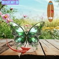 thumbnail image 5 of Rotating acrylic ornament featuring a vibrant green butterfly with intricate silver filigree and a dreamy pastel background, capturing magical realism and elegance, 5 of 6