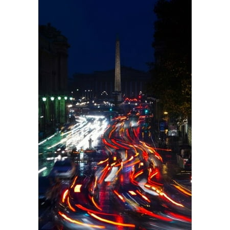 Elevated view of traffic on the road at night viewed from Eglise Madeleine church Rue Royale Paris Ile-de-France France Poster Print by Panoramic Images (24 x